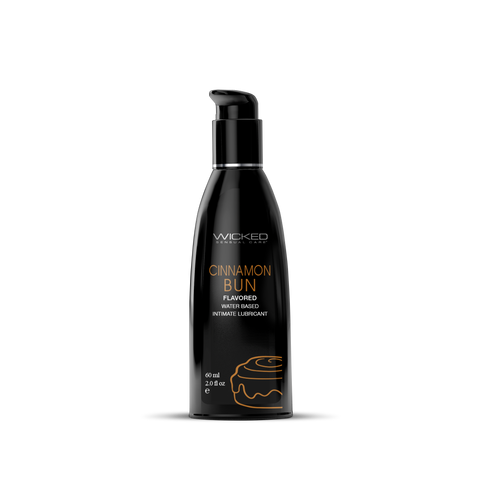 Black bottle of Wicked Sensual Care Cinnamon Bun flavored intimate lubricant on a white background