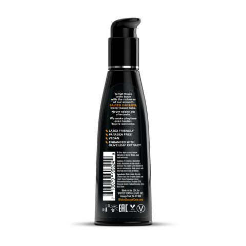 Black bottle with pump dispenser on a white background
