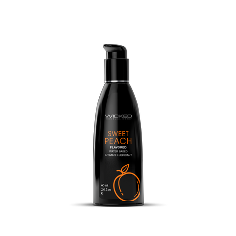 Black bottle of Wicked Sweet Peach flavored intimate lubricant on a black background